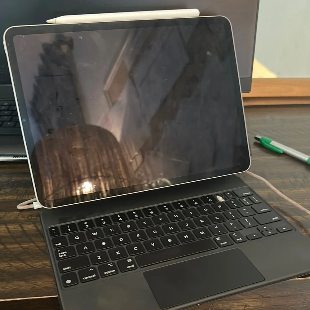 Apple Tablet with Black Keyboard and White Stylus